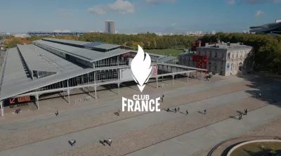 Photo de la Grande Halle de la Villette avec le logo Club France