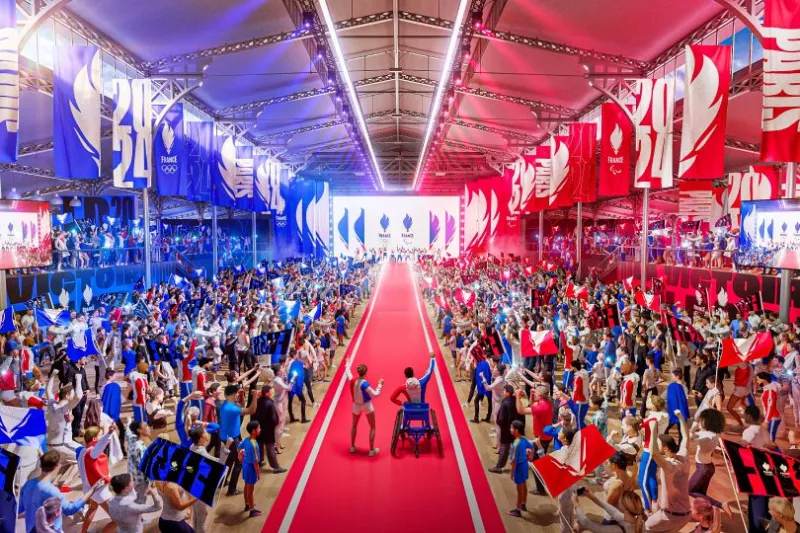 Image de synthèse de l'intérieur de la Grande Halle de la Villette en mode célébration des athlètes avec un couloir central et les supporters de chaque côté. La Halle est au aux couleurs du Club France en Bleu, Rouge.